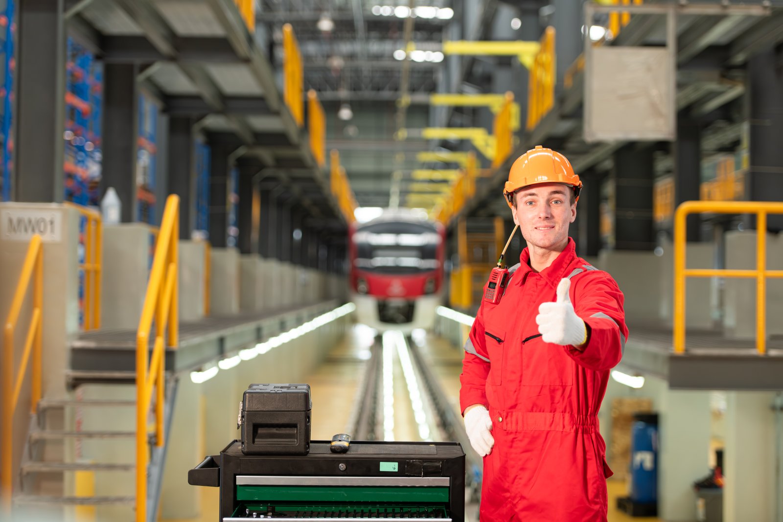 Portrait of engineer of the electric train industry, There is an electric train